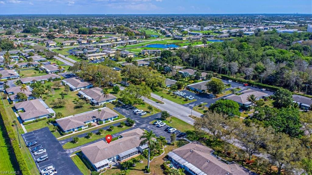 Aerial view of residential area with a nearby body of water