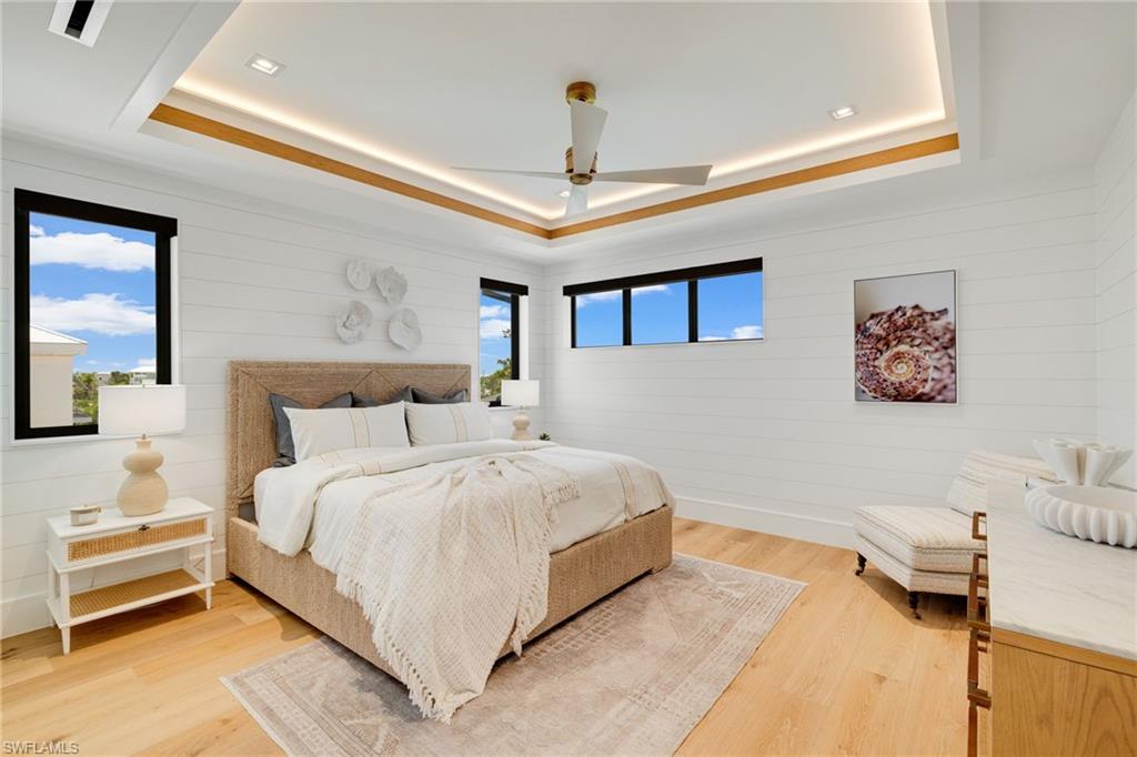 bedroom with shiplap wall trim