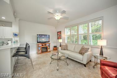 Living area featuring ceiling fan