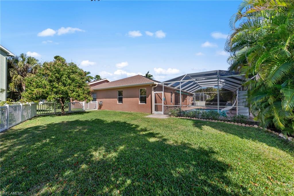 Large Private Yard with Mature Landscaping including Mango Tree