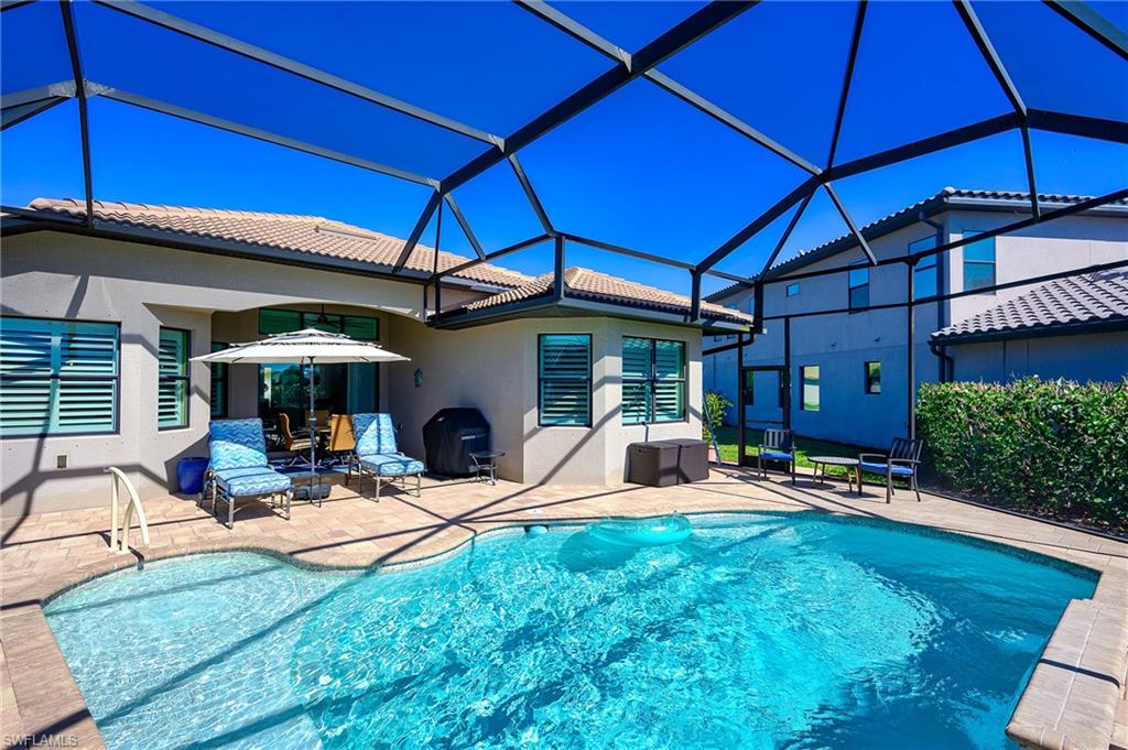Swimming pool with a patio