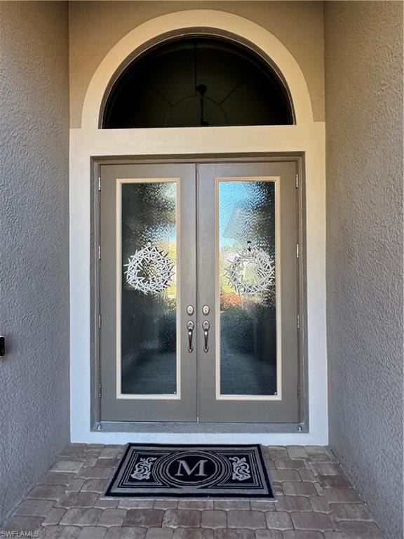 Hurricane impact resistant glass front doors