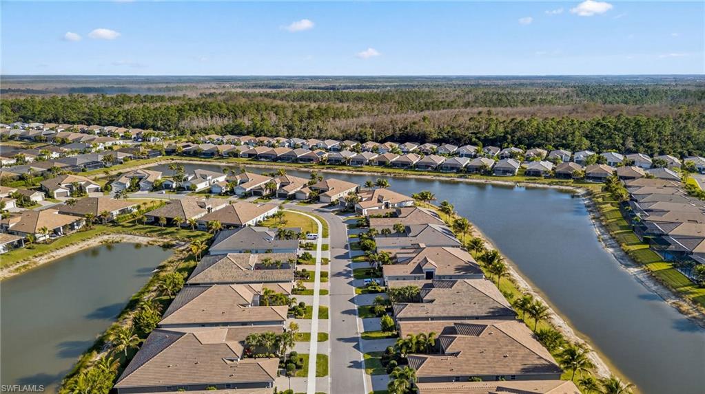 Aerial view of residential area with a large body of water