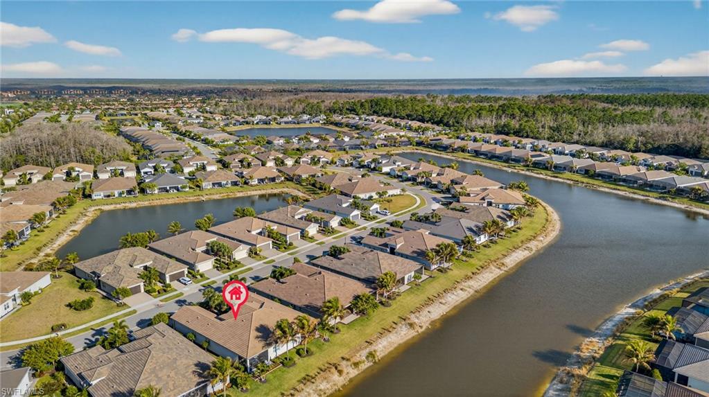 Aerial view of residential area with a nearby body of water