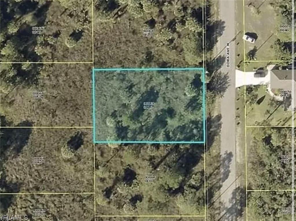 Aerial map of property and surrounding area with property parcel outlined