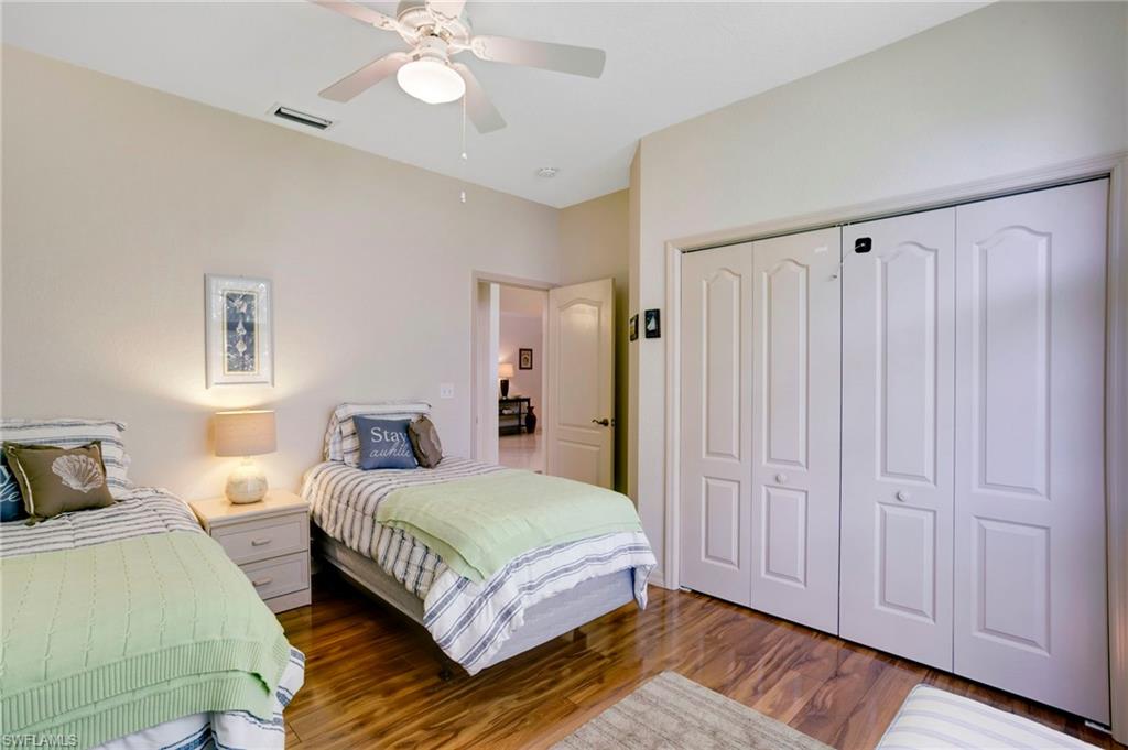 Guest bedroom is large and bright.