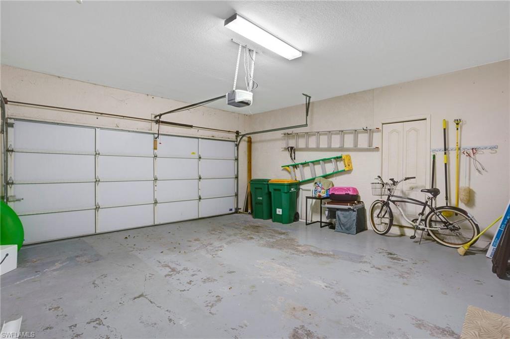 Spacious two-car garage is directly off the laundry room, with easy access to kitchen.