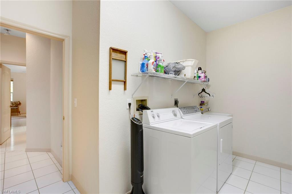 Large laundry room has laundry tub.