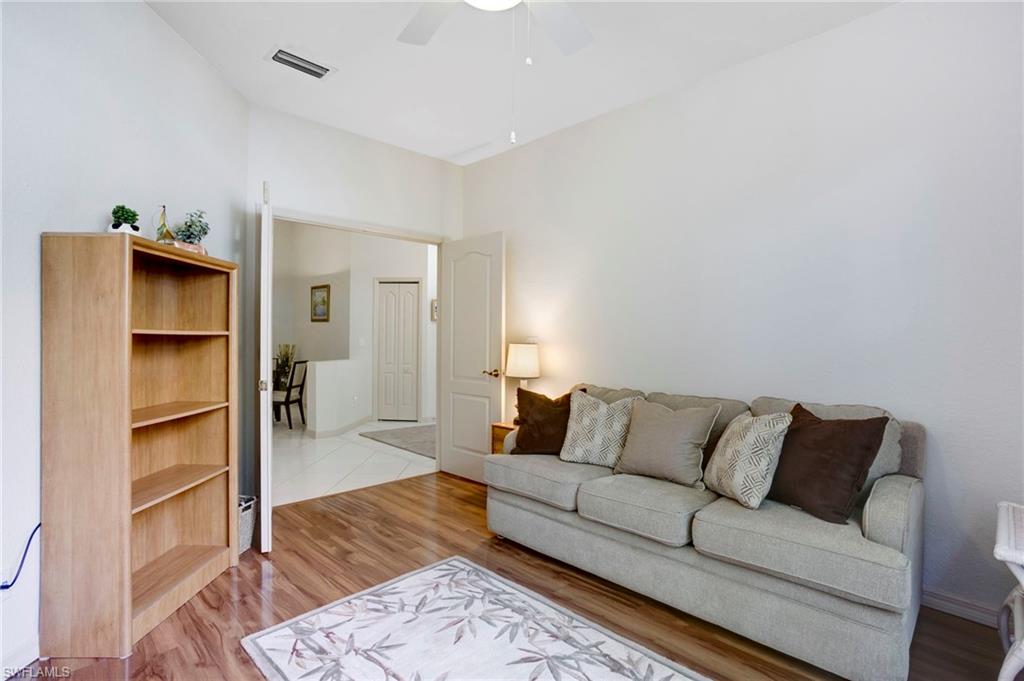 Den is bright and roomy. Double doors allow for privacy for working or sleeping.