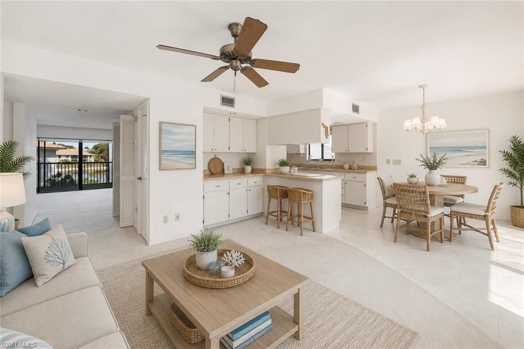 Virtually staged open den off kitchen