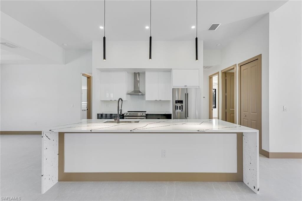 Large Granite kitchen Island plenty of room for stools