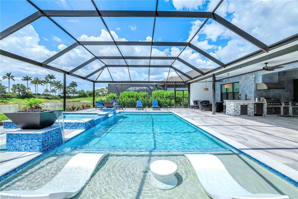 View of swimming pool with area for grilling, a patio area, ceiling fan, and a pool with connected hot tub