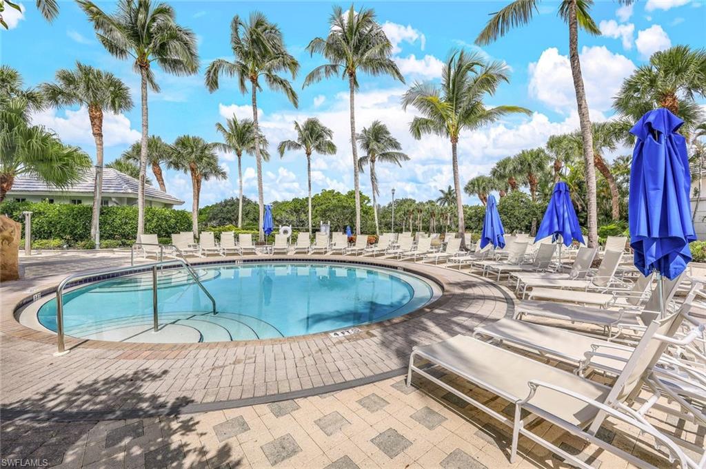 Community pool featuring a patio