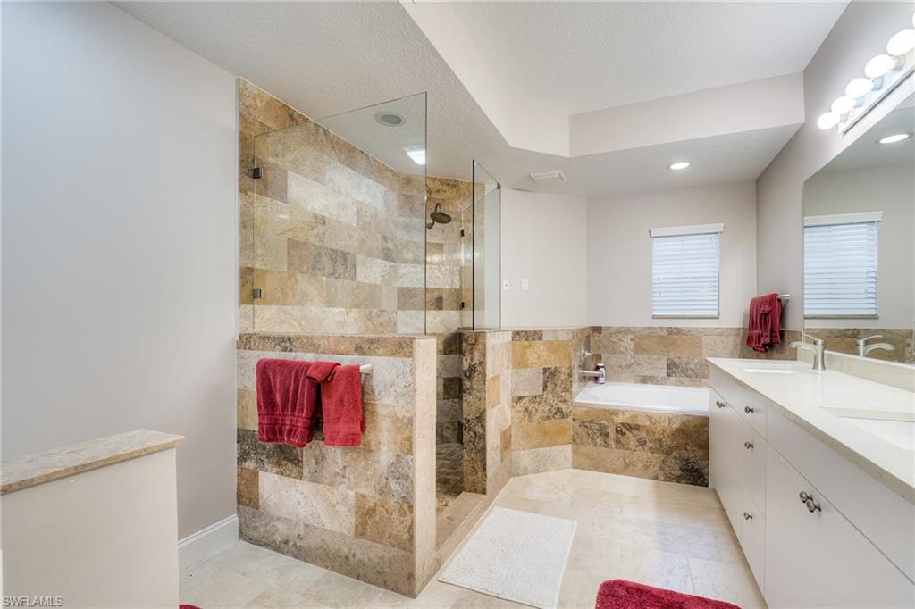 Separate shower and soaking tup in the master bath