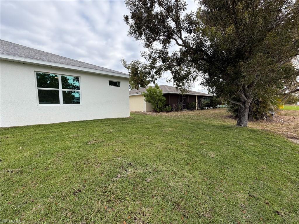 OVERSIZE, SEMI FENCED BACK YARD