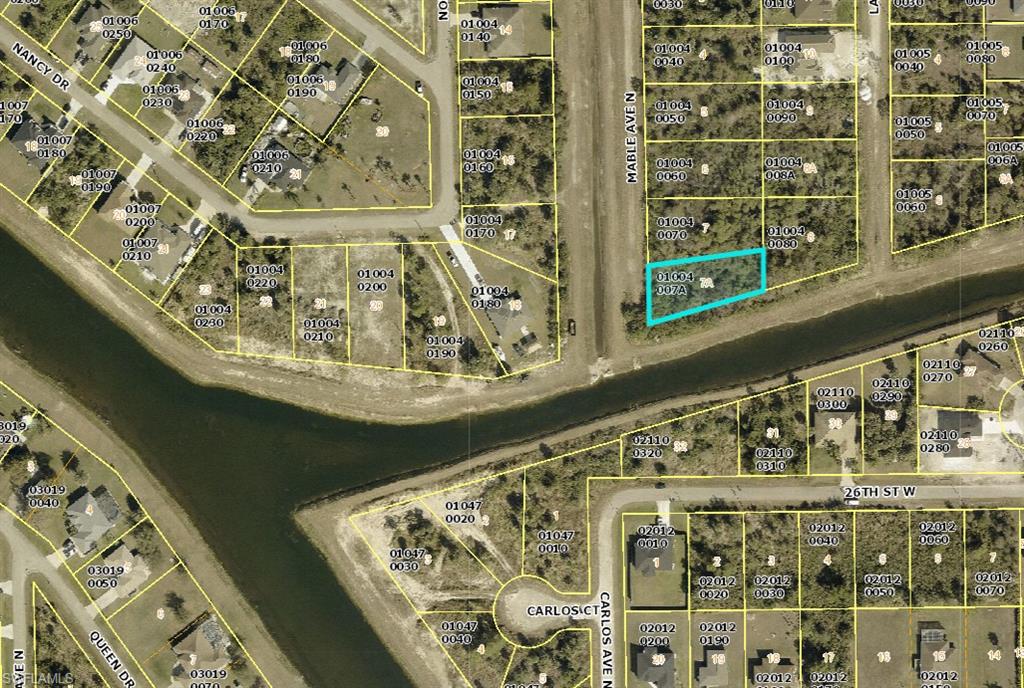 Aerial map of property and surrounding area with property parcel outlined