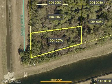 Aerial overview of property's location featuring property boundaries highlighted