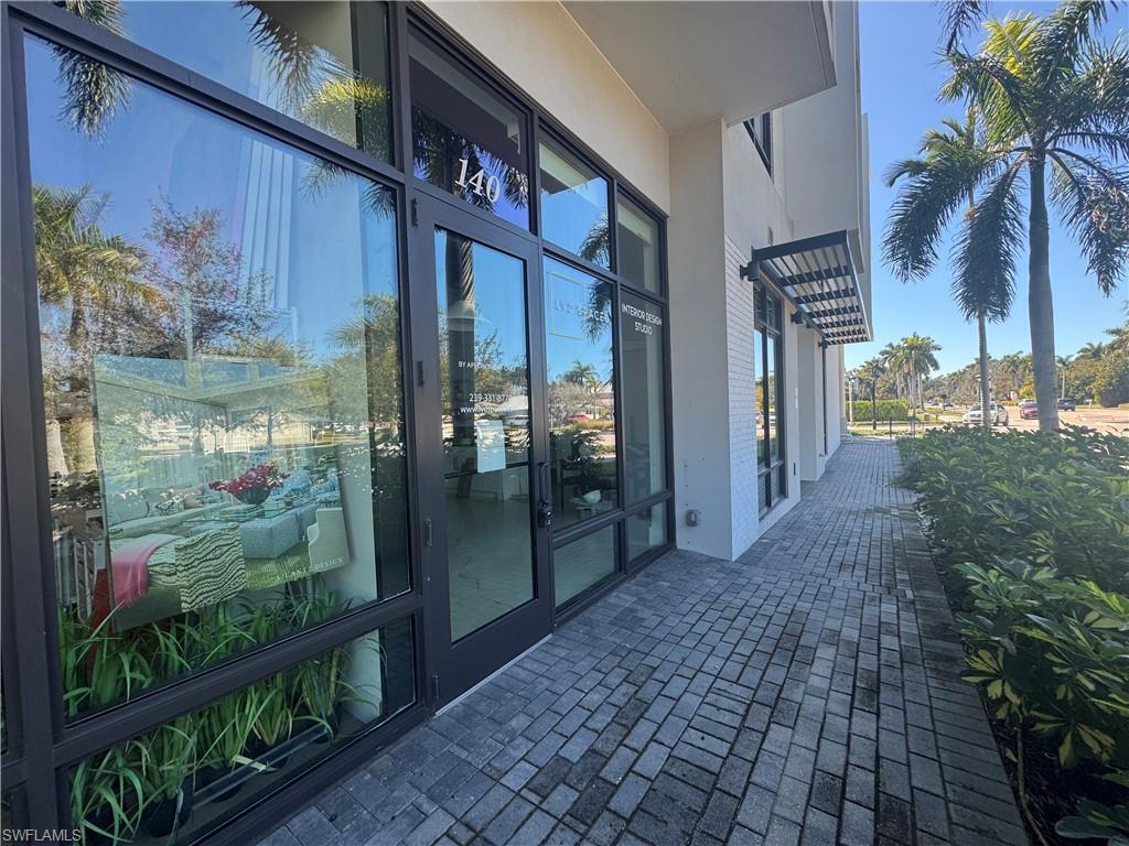 View of exterior entry with stucco siding