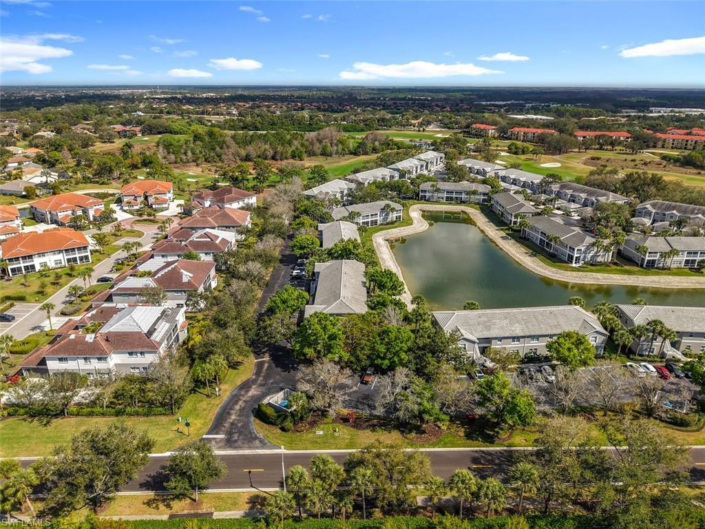 Aerial view of residential area with a large body of water