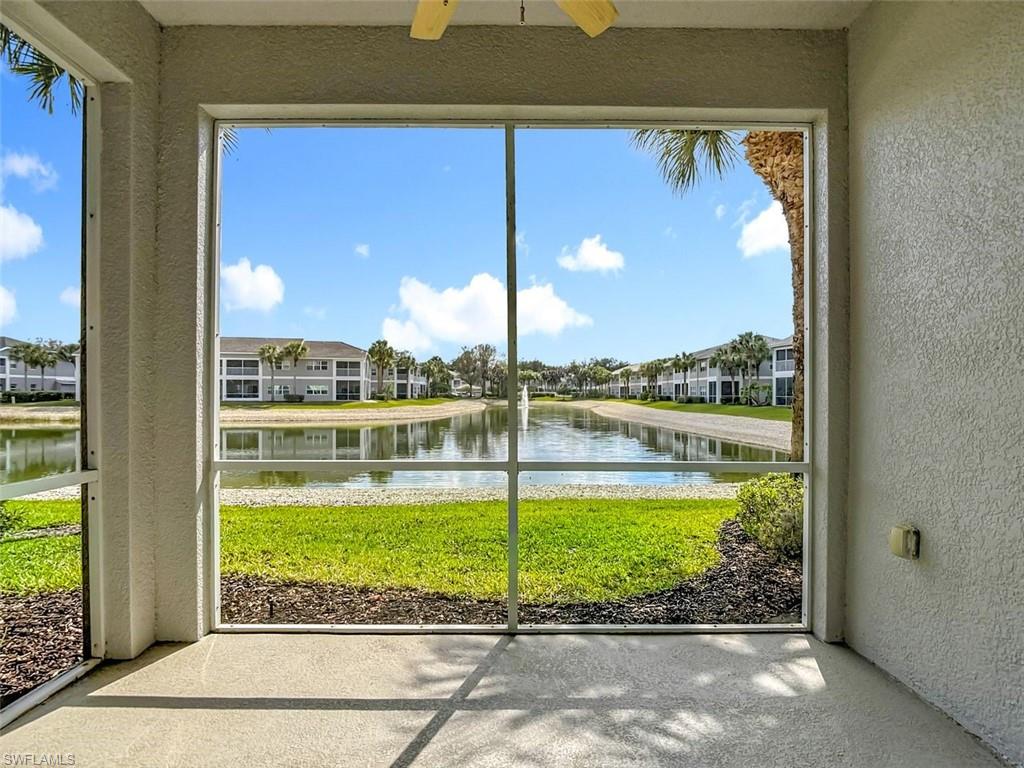 Unfurnished sunroom with a water view and plenty of natural light