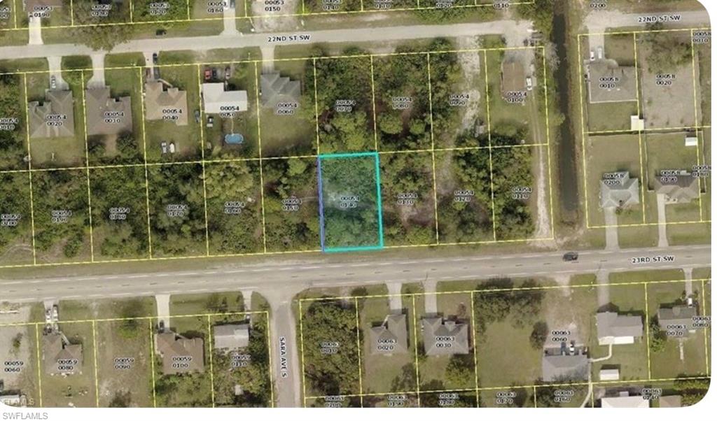 Aerial view of property's location featuring property parcel outlined