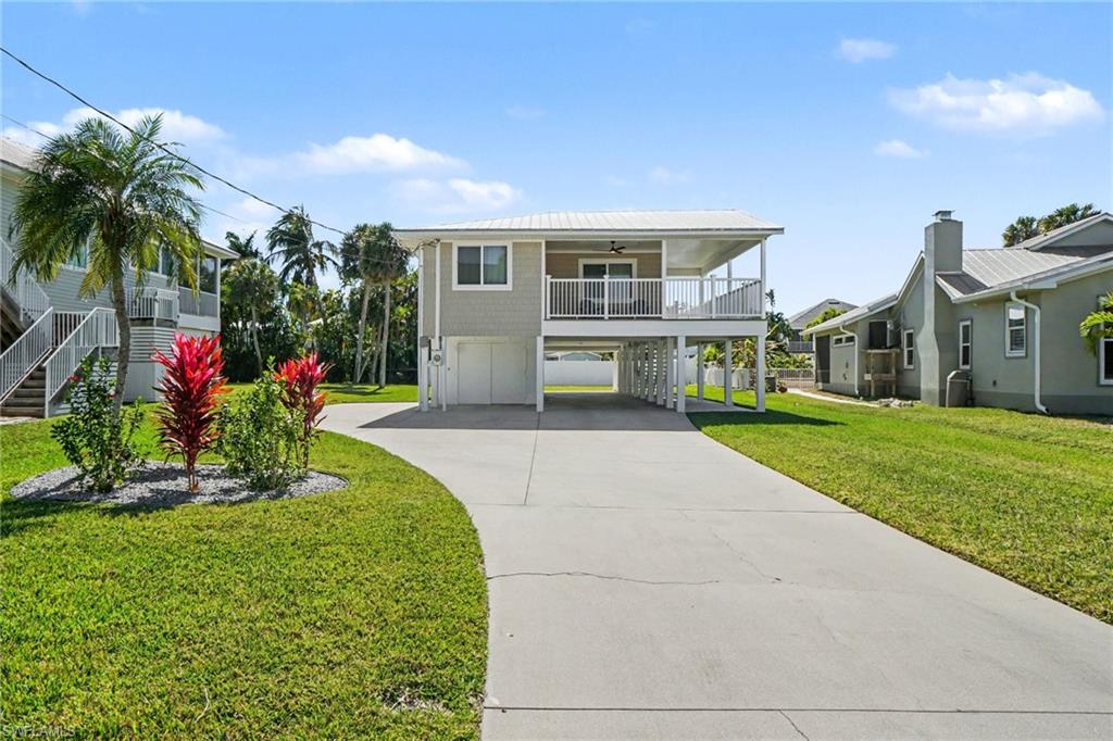 Huge driveway for plenty of parking and room for your boat.