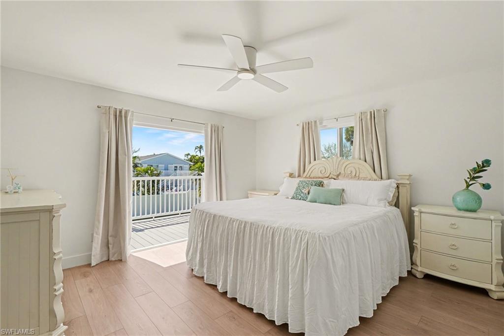 Primary bedroom with french doors to the amazing deck.