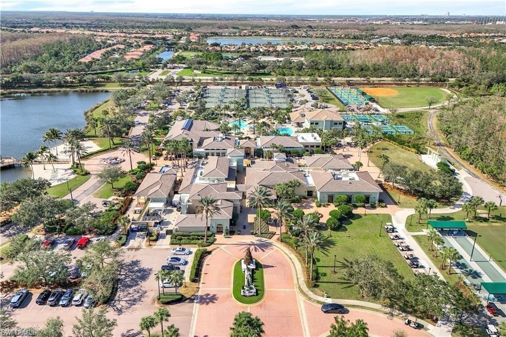 Aerial view of property's location with a large body of water