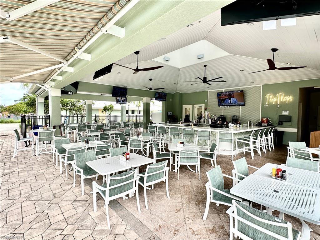 Dining area featuring vaulted ceiling