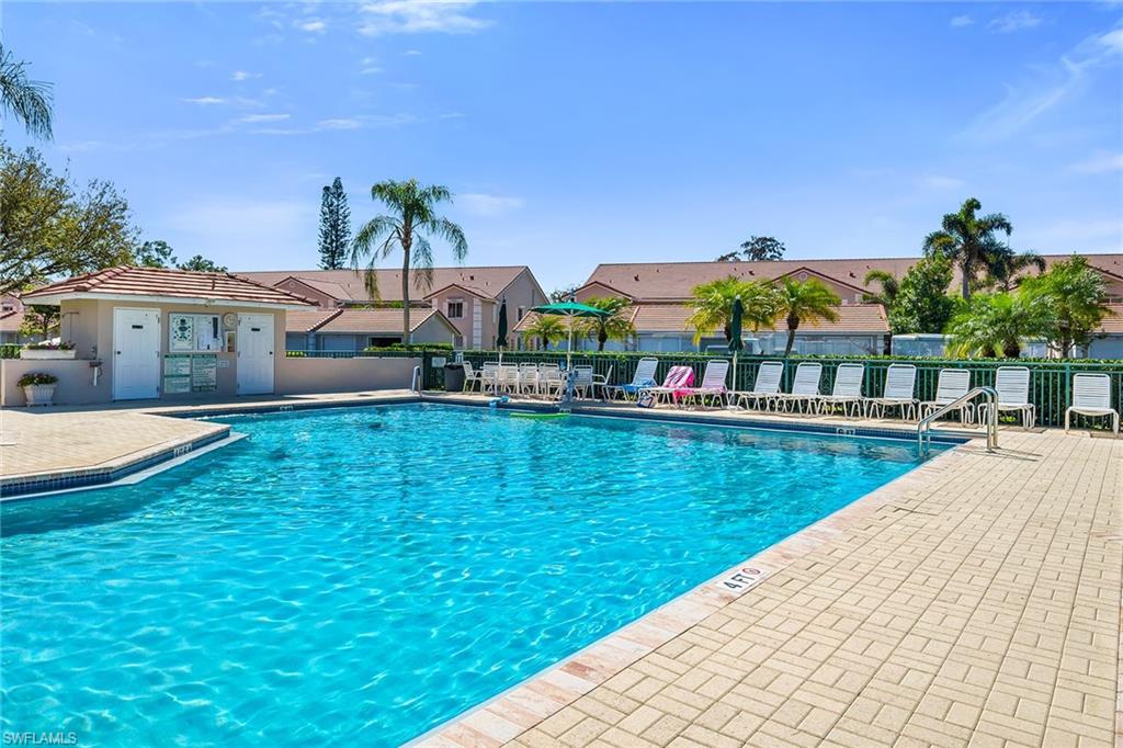 Community pool featuring a patio area