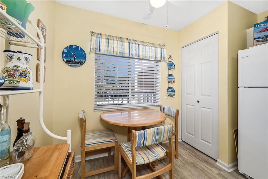 Dining area featuring light wood finished floors and ceiling fan