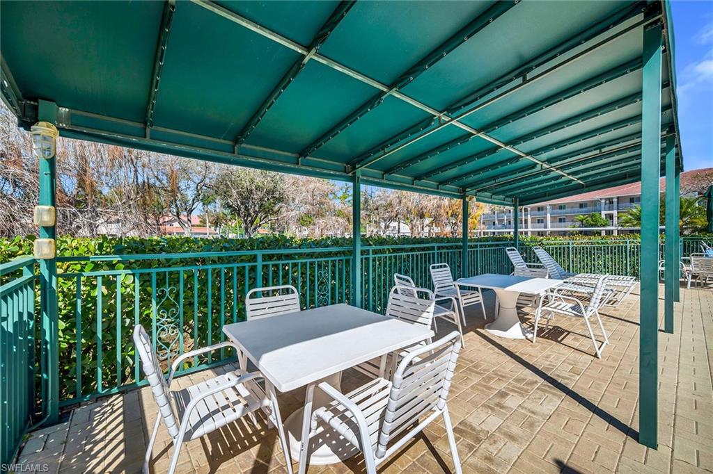 View of patio with outdoor dining space