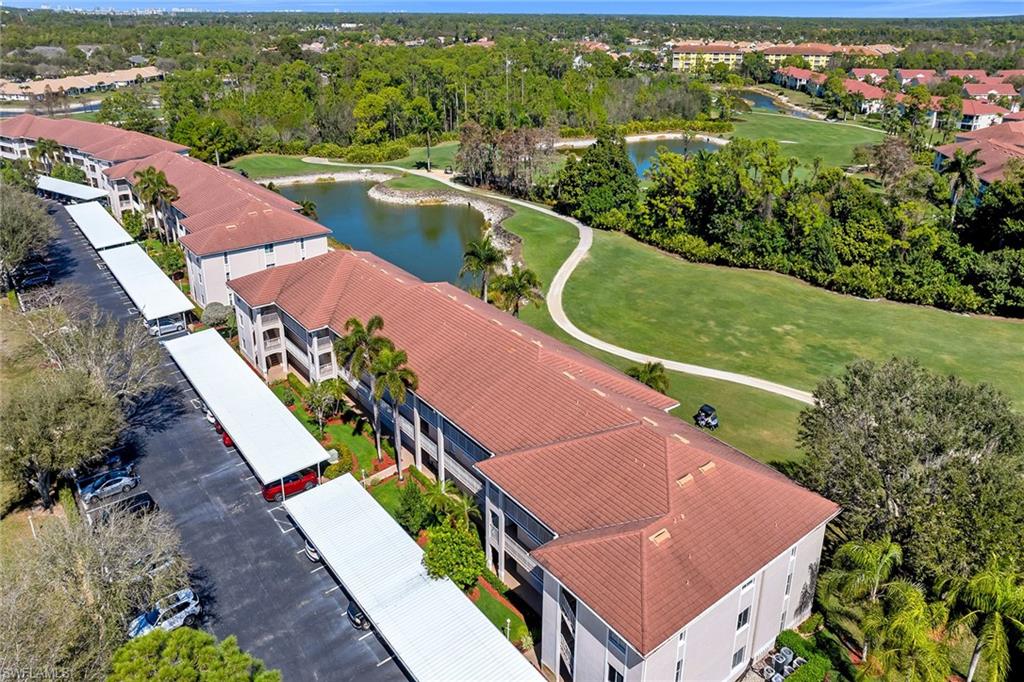 Bird's eye view of a nearby body of water and a golf club