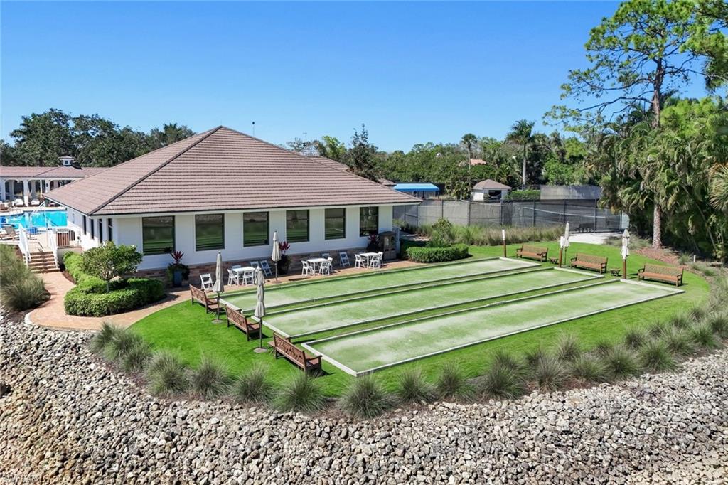 View of community featuring a bocce ball area and a patio area