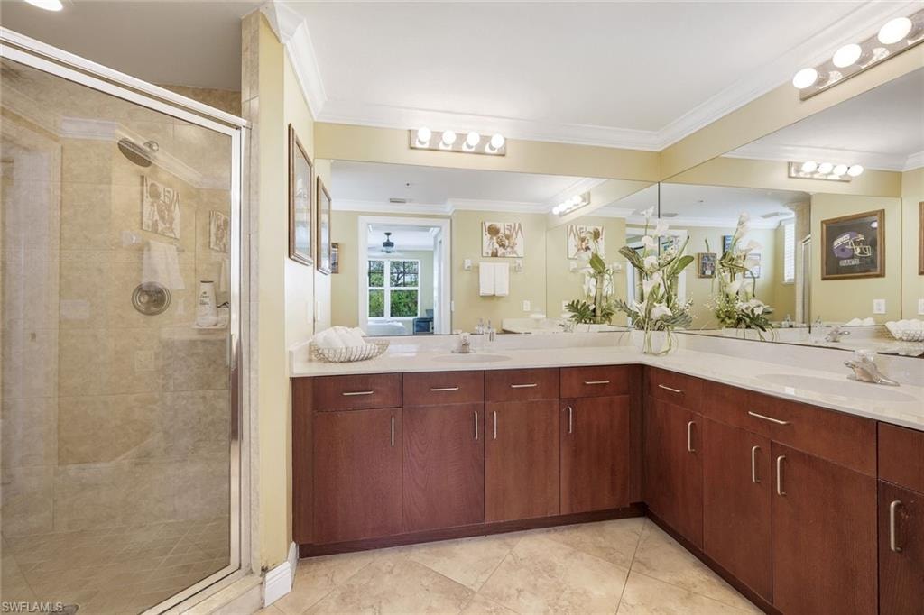 Glass Enclosed Shower and Dual Vanities