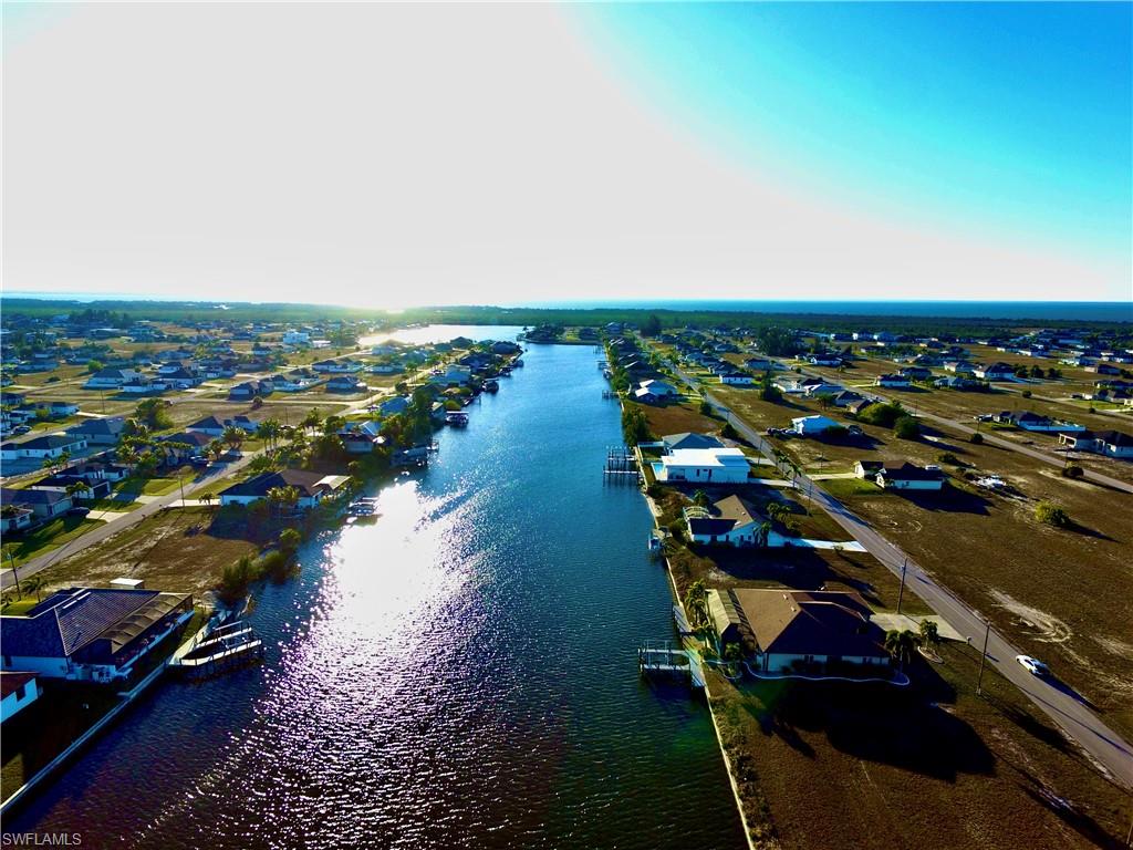 Aerial view of residential area with a large body of water