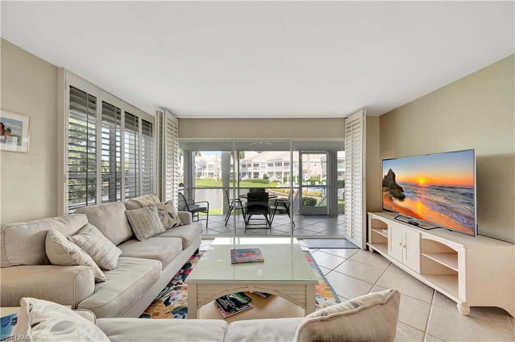 Smart TV and a view of the lake and community pool