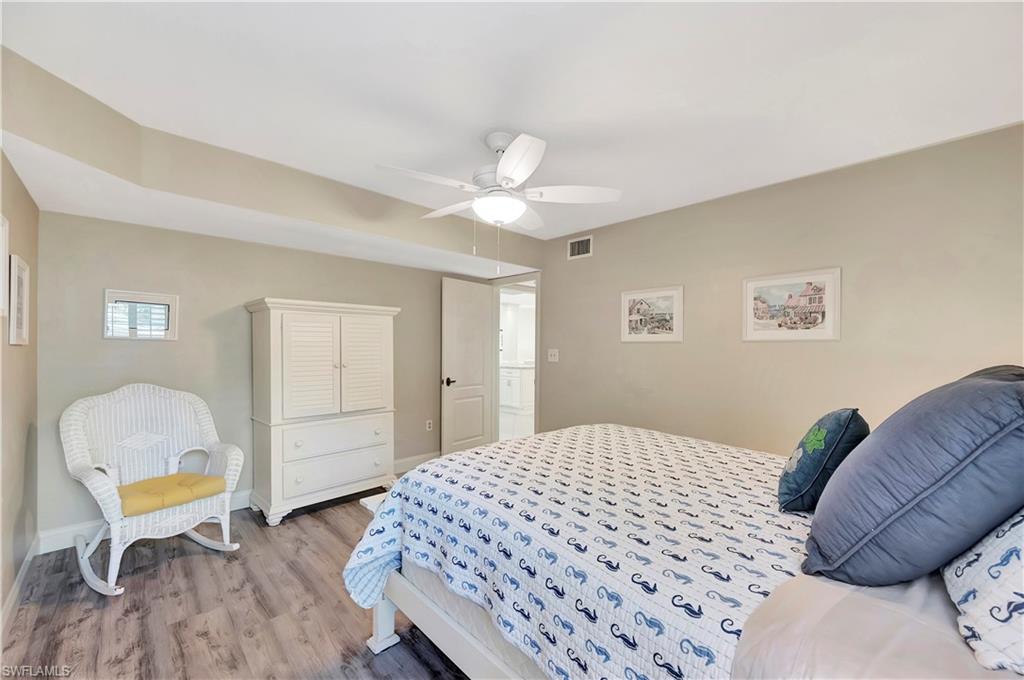 Guest Bedroom with Queen Bed and TV
