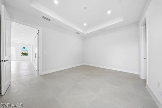 Unfurnished room with baseboards and recessed lighting