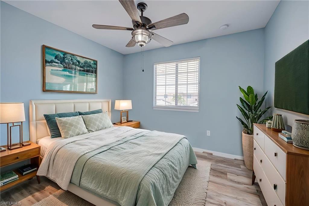 Bedroom featuring light wood finished floors and ceiling fan