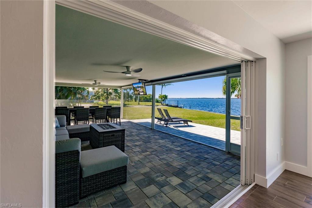 View of patio / terrace featuring outdoor dining space and ceiling fan