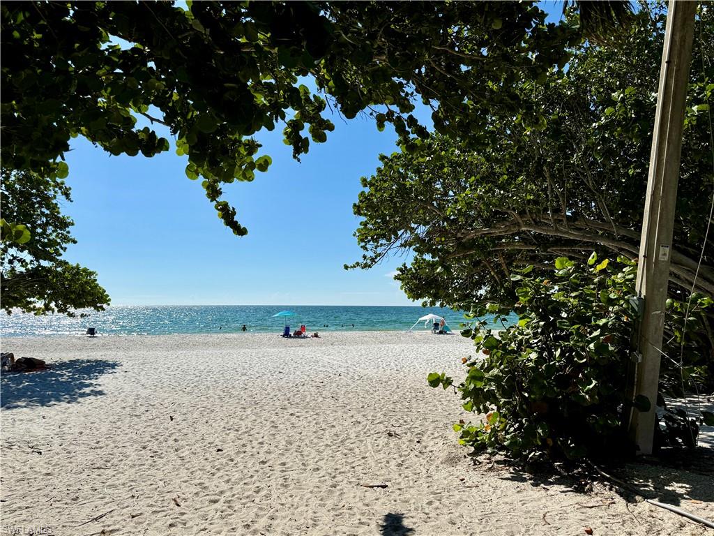 Property view of water with a view of the beach