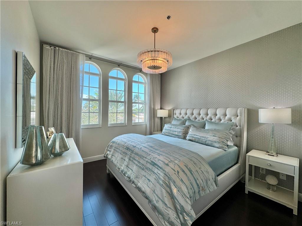 Bedroom featuring dark hardwood / wood-style flooring