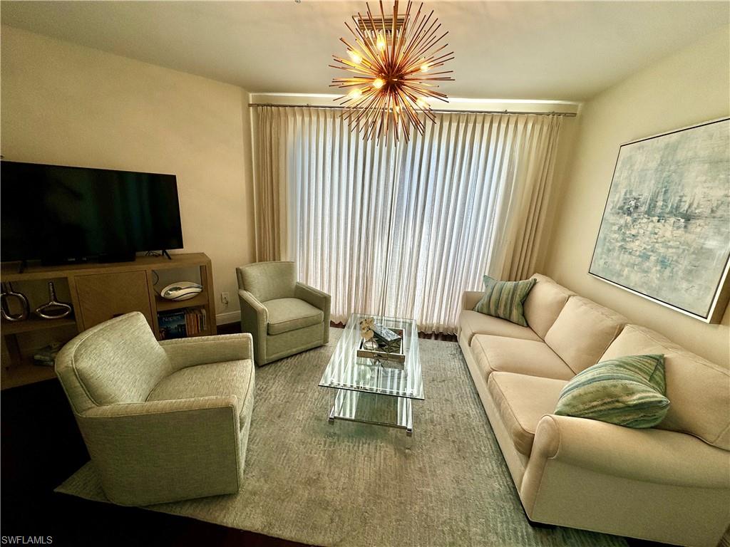 Living room with an inviting chandelier