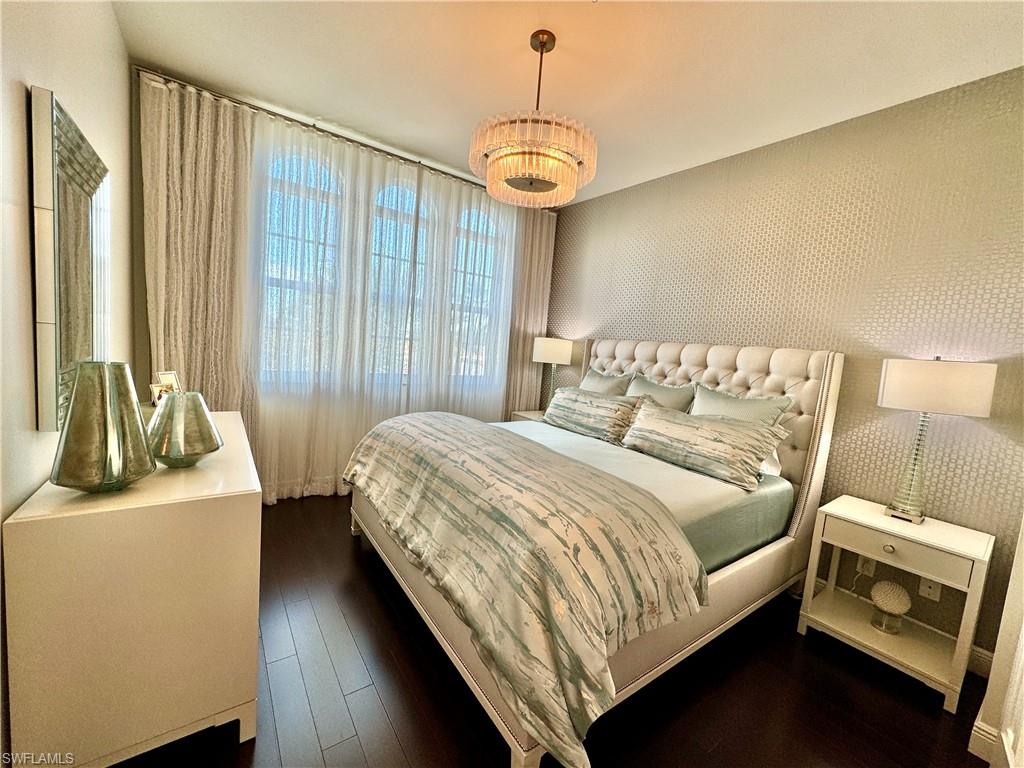 Bedroom featuring dark hardwood / wood-style floors