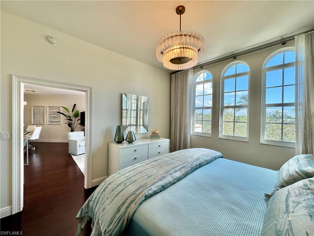 Bedroom featuring dark hardwood / wood-style floors