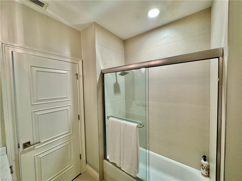 Bathroom with shower with separate bathtub