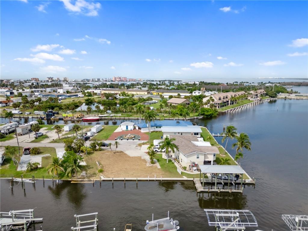 Aerial view of residential area with a nearby body of water