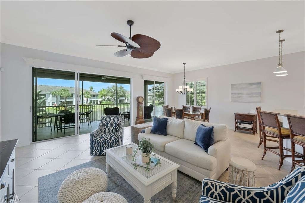 Spacious living room with soaring ceilings, abundant natural light, and an open design that creates an inviting space for relaxing or entertaining.