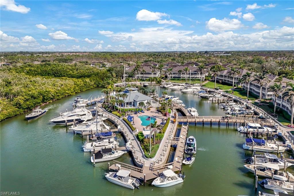 The private marina at Windstar on Naples Bay is located just steps away, offering convenient access to boating, waterfront living, and the beauty of Naples Bay.